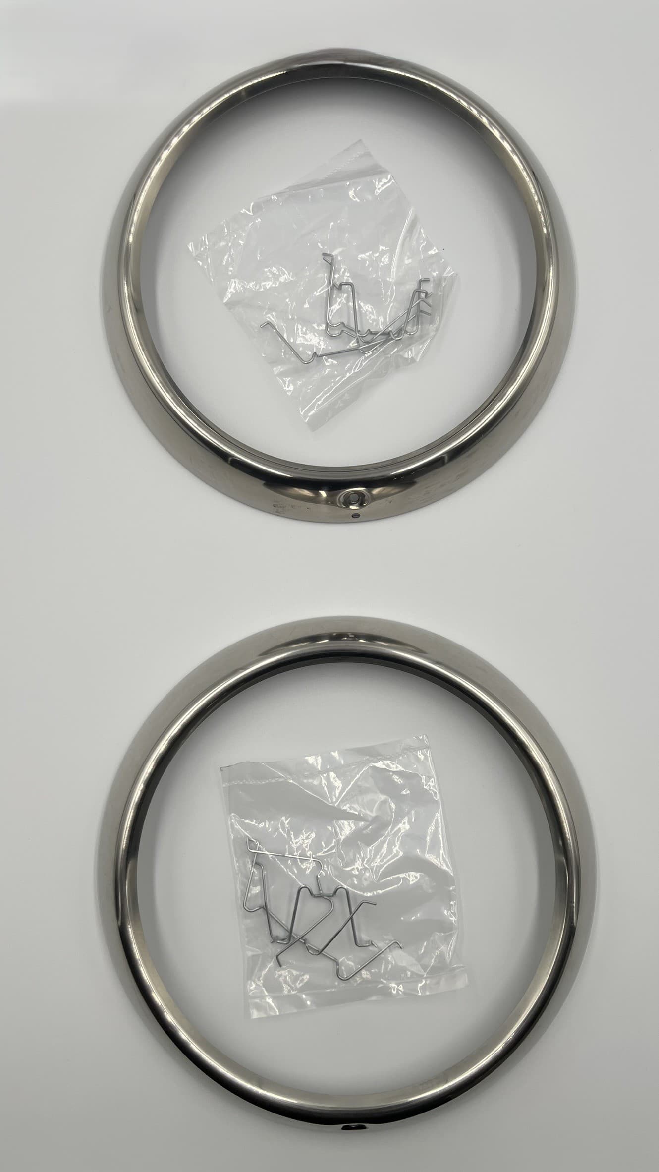 HEADLIGHT BEZEL WITH CLIPS 47-55